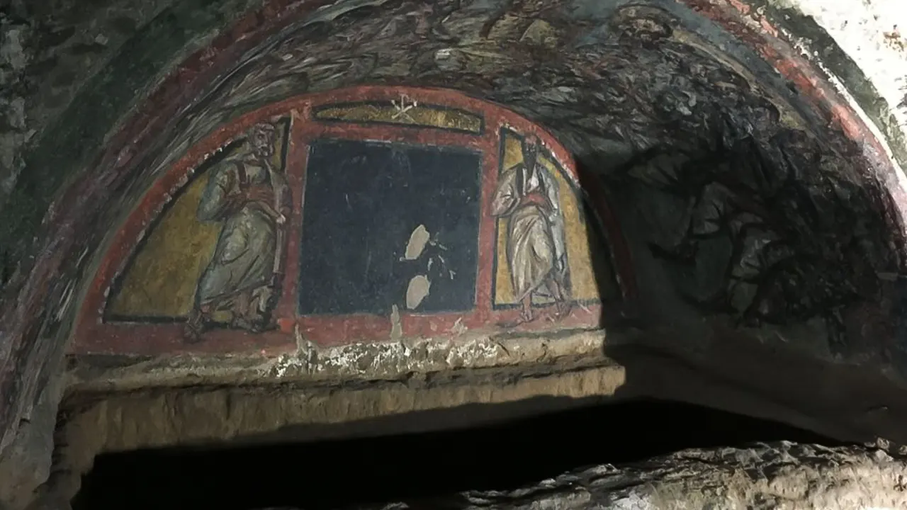 Catacombs with a tour guide by Transport